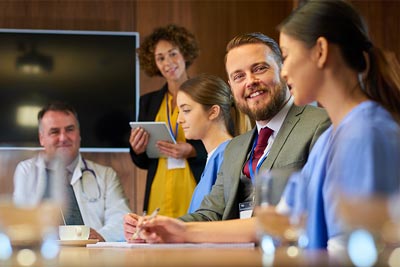 Health care team at board room table