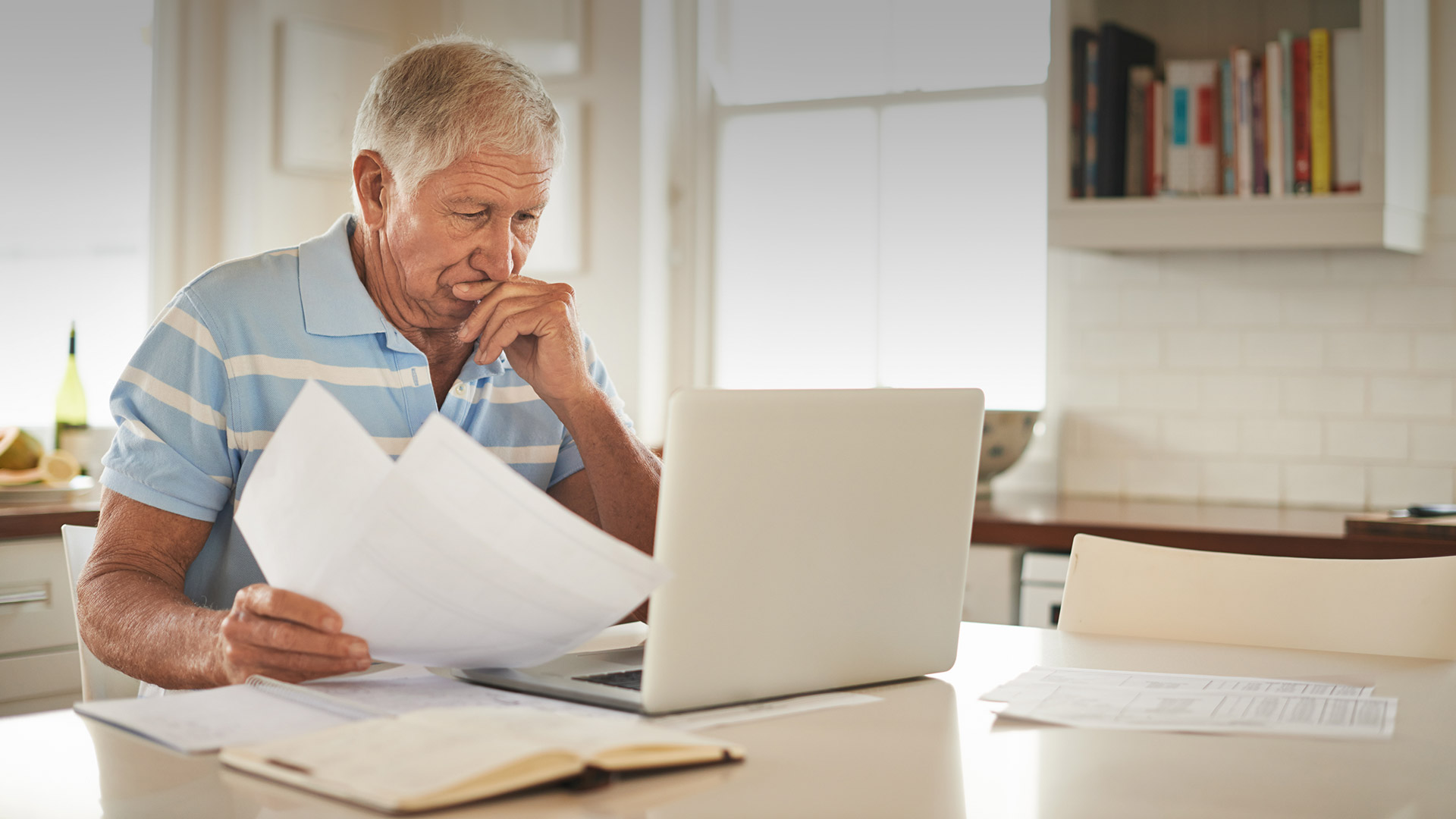 Elderly man staying up to date and following guidance from the CDC and your state and local public health departments.